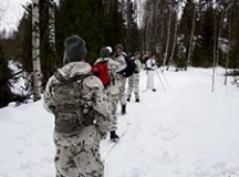 Soldiers from the 54th Engineer Battalion of the 21st Theater Support Command’s 18th Engineer Brigade practice newly learned Nordic skiing skills while following the instructions of a Finnish army instructor during a joint training mission with the Finland army Jan. 30. Seven Soldiers from the 54th Engineer Battalion attended the winter combat training with the Finnish Defensive Forces in order to train on arctic survival and combat techniques.