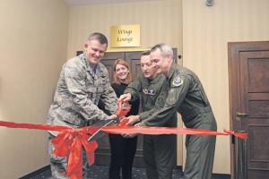 Gen. Frank Gorenc, U.S. Air Forces in Europe and Air Forces Africa commander; Trish Dotson, Ramstein Officers’ Spouses Club president; Brig. Gen. Patrick X. Mordente, 86th Airlift Wing commander; and Lt. Gen. Darryl Roberson, 3rd Air Force commander, cut a ribbon to signify the grand opening of the newly renovated Wings Lounge Dec. 5 at the Ramstein Officers’ Club. The new lounge boasts custom tabletops, recent mission photos and a snooker table, which is used to play the game Crud.