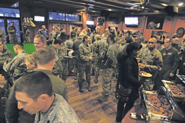 Ramstein Airmen socialize during the reopening of the newly renovated Wings Lounge Dec. 5 at the Ramstein Officers’ Club. The lounge was created for Airmen to be able to relax and have a good time with other Airmen and service members.