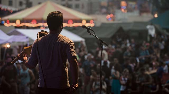 Photo by Senior Airman Jonathan StefankoViolinist Robert Mineo plays during “The Rockin’ 4th” celebration on Ramstein.