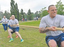 Photo by Tech. Sgt. Daylena S. RicksThe 786th Force Support Squadron tug-of-war team tugs with all their strength during Resilience Day Sept. 11 on Ramstein. This year’s Resilience Day featured a commander’s challenge made up of different athletic events to challenge Airmen. The challenge included a three-on-three basketball tournament, six-on-six volleyball match, dodgeball, soccer, one pitch softball, one pitch kickball, seven-on-seven flag football, hula-hoop competition, three-legged race, 400 meter tricycle team relay, Humvee push, tug-of-war and golf challenge, and it concluded with a Colonels vs. Chiefs softball game.