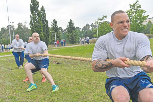 Photo by Tech. Sgt. Daylena S. RicksThe 786th Force Support Squadron tug-of-war team tugs with all their strength during Resilience Day Sept. 11 on Ramstein. This year’s Resilience Day featured a commander’s challenge made up of different athletic events to challenge Airmen. The challenge included a three-on-three basketball tournament, six-on-six volleyball match, dodgeball, soccer, one pitch softball, one pitch kickball, seven-on-seven flag football, hula-hoop competition, three-legged race, 400 meter tricycle team relay, Humvee push, tug-of-war and golf challenge, and it concluded with a Colonels vs. Chiefs softball game. 