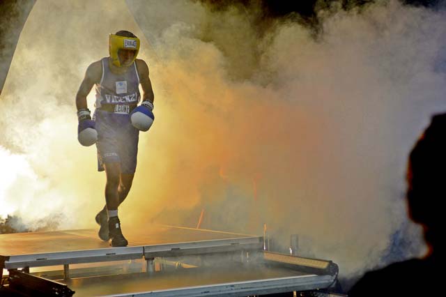 Photo by Airman 1st Class Jordan CastelanA boxer makes his entrance to the ring during the Installation Management Command-U.S. Forces Boxing Championship May 11, 2013, in Wiesbaden, Germany. This year’s competition was hosted by U.S. Army Garrison Wiesbaden. Boxers from the KMC participated as well.