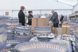 Ramstein bazaar volunteers set out Polish pottery to be sold at the Ramstein bazaar. 