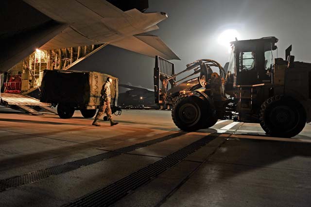 Photo by Airman 1st Class Holly MansfieldMembers of the 86th Aircraft Maintenance Squadron and the 37th Airlift Squadron help load cargo into a C-130J Super Hercules Jan. 7, 2013, on Ramstein. The 86th Airlift Wing provides support to the NATO-led coalition augmenting Turkey’s air defense capabilities and contributing to the de-escalation of the crisis along the border. 