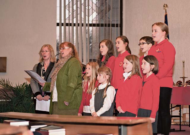 Photo by Staff Sgt. Kris LevasseurChildren from St. David’s Primary School in Ramstein sing Christmas carols at the ceremony Dec. 4.
