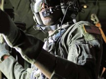 Airman 1st Class Ralph Colas, 37th Airlift Squadron loadmaster, waits for the OK to allow U.S. Army Soldiers from the 1-91 Cavalry Regiment, 173rd Infantry Brigade Combat Team (Airborne), Grafenwöhr, Germany, to jump over Estonia July 8.