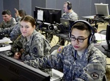 Pfc. Andrew Hernandez (right), intelligence analyst with B Co., 24th Military Intelligence Battalion, 66th Military Intelligence Brigade, and Spc. Andrea Willette (left), intelligence analyst with Headquarters and Headquarters Battery, 10th Army Air and Missile Defense Command, chart  missile 
launches during a simulated missile volley. The Soldiers are training with others from across U.S. Army Europe in a 10th AAMDC missile defense 
exercise.