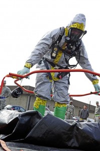 Photo by Senior Airman Hailey HauxAirman 1st Class Eric Roberts, 86th Aerospace Medical Squadron bioenvironmental engineer journeyman, goes through decontamination after leaving a crime scene during a biological response exercise on Ramstein. The squadrons train quarterly to stay prepared for real-world situations. 