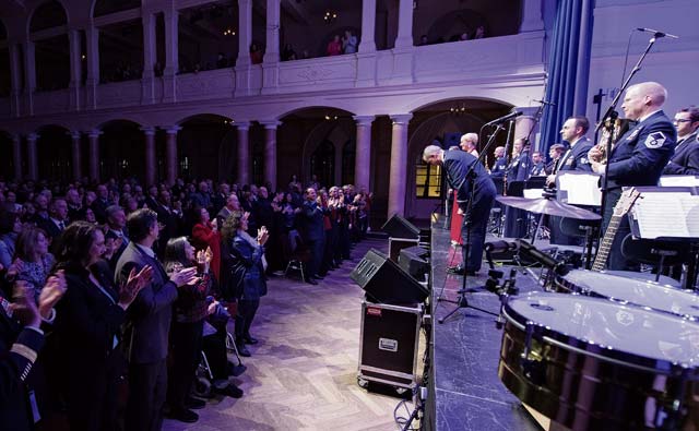 An audience gives the U.S. Air Forces in Europe Band and the Rheinland-Pfalz International Choir a standing ovation during the annual KMC Christmas Concert Dec. 12 in Kaiserslautern.