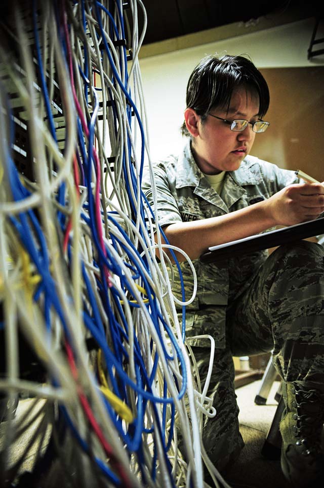 Photo by Airman 1st Class Hailey HauxGood communicationsAirman Lianna Spencer, 86th Communications Squadron client systems technician, adds a computer to the network June 26 on Ramstein. The 86th CS services more than 500 computer trouble tickets a month.