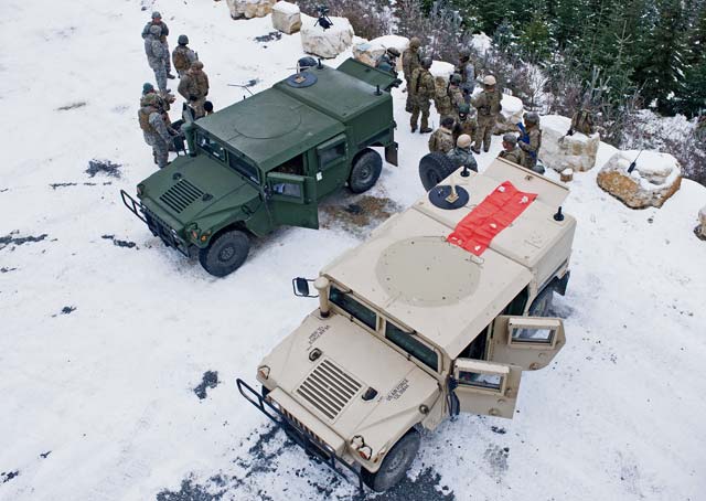 Photo by Senior Airman Jonathan StefankoAirmen with the 435th Air Ground Operations Wing undergo a simulated live-fire exercise Feb. 5 in Grafenwöhr, Germany. The 435th AGOW establishes expeditionary airfield operations and communications and provides theater-wide combat support and training.