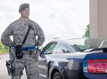 Airman 1st Class Jonathan Ebner, 86th Security Forces Squadro elite gate guard, stands at parade rest after controlling the entry of a vehicle May 23 on Ramstein. Defenders go through a rigorous selection process to be a member of the newly created Elite Gate Guard Section at Ramstein.
