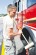 Keeping it clean: Airman 1st Class Dennis Lockaby, 86th Civil Engineer Squadron firefighter, performs basic maintenance on a fire truck June 18 on Ramstein. Daily upkeep is done to ensure equipment performs properly for each call. 