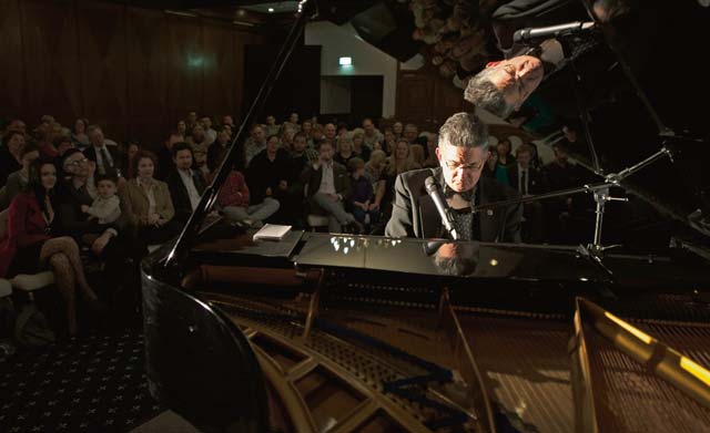 Photo by Senior Airman Damon KasbergWorld-renowned concert pianist Marvin Goldstein plays love songs for an audience Feb. 21 in the Ramstein Officers’ Club. Goldstein said he believes music has a unique ability to bring people together regardless of race, religion or politics. During the free concert he interacted with the audience, playing requests and adding comedic remarks, using the crowd’s reaction to decide what songs to play next. Goldstein’s son, Senior Airman Nicholas Goldstein, is currently stationed at Ramstein working with the 700th Contracting Squadron as a contract administrator. He suggested to his father to perform for the base during his visit. 