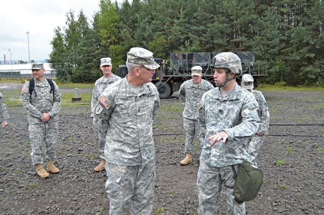Photo by Staff Sgt. John ZumerSenior leader visits air defendersCapt. Kyle Surridge (right), commander of Alpha Battery, 5th Battalion 7th Air Defense Artillery, emphasizes a point to Maj. Gen. Richard Longo, deputy commanding general of USAREUR, during Longo’s visit to Rhine Ordnance  Barracks Sept. 18. Leaders used the opportunity to answer many questions that Longo had regarding unit and equipment capabilities.