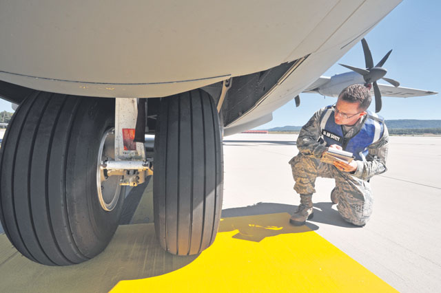 Photo by Senior Airman Aaron-Forrest WainwrightSafety inspectionStaff Sgt. Joseph Hernandez, 86th Airlift Wing ground safety inspector, surveys a C-130J Super Hercules Sept. 4 on Ramstein. Safety inspectors from the 86th AW ensure Team Ramstein is always ready to execute the mission.