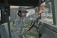 Pvt. Antoinette Sewell, a human resources specialist with the 21st Special Troops Battalion and a native of Chicago, checks the windshield washer fluid on a Humvee during a Preventive Maintenance, Checks and Services, July 29. Sewell along with other Soldiers from the STB conduct PMCSs on a weekly basis. 