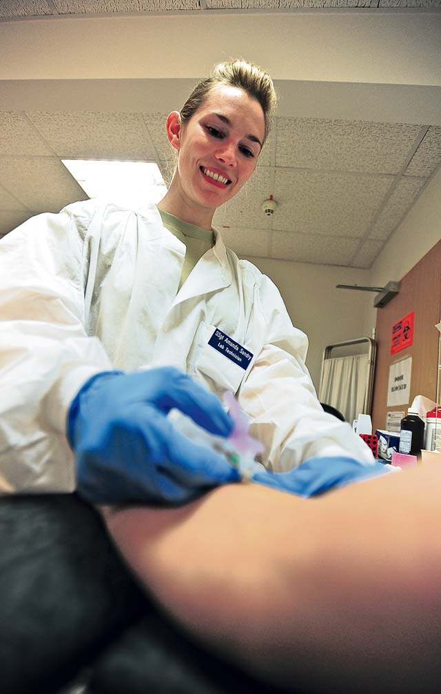 Photo by Senior Airman Aaron-Forrest Wainwright>br>Medical supportStaff Sgt. Amanda Sandry, 86th Medical Support Squadron lab technician, draws blood from a patient Sept. 11 on Ramstein. The 86th MDSS laboratory helps ensure Airmen are always combat ready. 