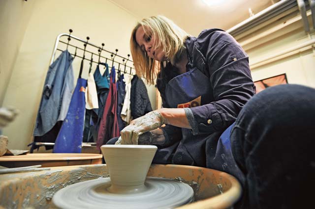 Photo by Senior Airman Aaron-Forrest WainwrightPotteryArts and Crafts Center customer Sarah Crivellaro throws pottery Sept. 19 on Ramstein. The Ramstein Arts and Crafts Center is open from 11 a.m. to 6 p.m. and offers pottery, ceramics  and engraving classes throughout the year. 