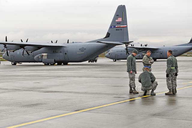 Airmen from the 786th Civil Engineer Squadron work on a static ground installation for parked aircraft.