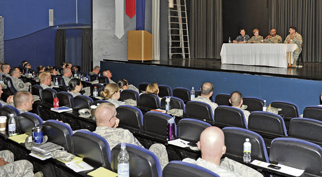 Air Force, Navy and Army NCOs answer questions during the Joint Professional Development Seminar July 18 at Ramstein’s Hercules Theater. The seminar was conducted to encourage service members to continue to stay committed to their respective branches of service. 