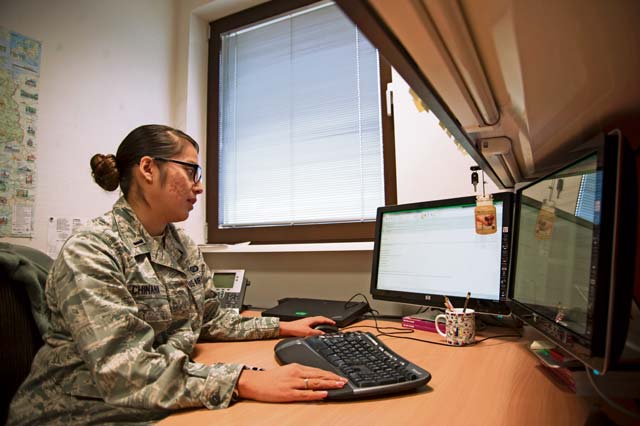 First Lt. Delilah Chinana, 521st Air Mobility Operations Wing contract airlift and terminal ops chief, responds to emails Nov. 14 regarding  airline contracts as part of her job to ensure Airmen and their family members fly in clean and safe aircraft. Chinana is Walatowa from the Pueblo of Jemez in New Mexico. She is one of many Native Americans currently serving in the Air Force.