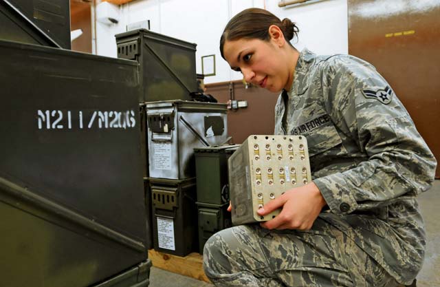 Airman 1st Class Jasmine Luce, 86th Munitions Squadron conventional maintenance crew member, makes sure numbers match up on ammunition cans to prepare for a 100 percent accountability inspection Feb. 13 on Ramstein. 