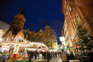 Photo by City of KaiserslauternThe Christmas market set up in front of Stiftskirche in Kaiserslautern offers many food specialties, the traditional Glühwein and a merry-go-round for children.