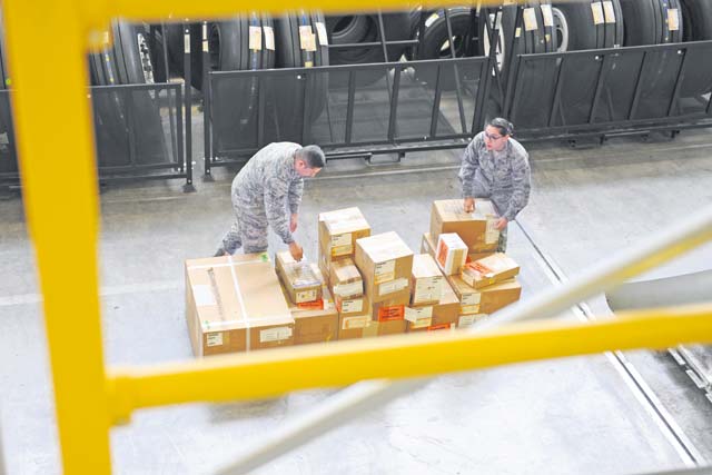 Supply journeymen from the 86th Logistics Readiness Squadron sort equipment and prepare for a contingency tasking.
