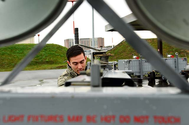 Airman 1st Class Jonathan Penata, 86th Maintenance Squadron Aerospace Ground Equipment technician, returns a  generator to its storage area Oct. 10 on Ramstein. The 86th AGE flight maintains all ground equipment for any aircraft coming through Ramstein.