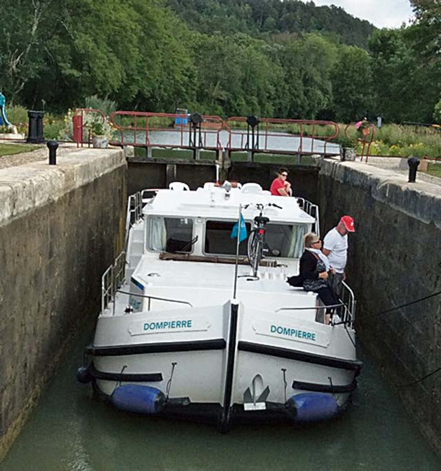 Photo by Cheri de HaasA boat waits in one of the many locks of the Burgundy canal in France in July.