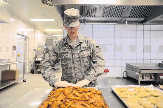 Photo by Airman 1st Class Michael StuartAirman 1st Class Mark Pulley, 786th Force Support Squadron food service specialist, prepares meals in the flight kitchen. The 786th FSS provides flight meal support for local and worldwide missions. The squadron supplies approximately 250 meals a day.