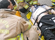 Photo by Airman 1st Class Holly MansfieldFirefighters from the 86th Civil Engineer Squadron stabilize a simulated victim during training Aug. 28 on Ramstein. The training was held to challenge the readiness of first responders to vehicle accidents.