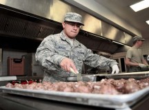 Staff Sgt. Ruben Vasquez, 786th Force Support Squadron food service supervisor, removes meatballs from a baking sheet Oct. 7 on Ramstein. The Rhineland Inn Dining Facility offers four meals a day in order to provide a low-budget meal option for Airmen working around the clock.