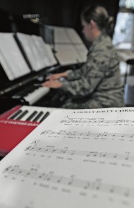 Airman 1st Class Melissa Lackore, U.S. Air Forces in Europe and Air Forces Africa Band vocalist, runs through new Christmas music she plans to perform at an event on Ramstein.