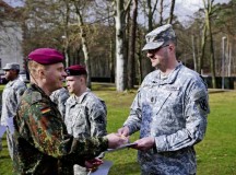 Photo by Brandon BeachFirst Lt. Thomas Gohritz (left), German liaison and company commander with the 263rd Airborne Infantry Battalion, presents a gold Schützenschnur (German Armed Forces Marksmanship Badge) to Sgt. Maj. Michael Clauss, 21st Theater Sustainment Command, Headquarters and Headquarters Company, during an awards ceremony Feb. 21 on Panzer Kaserne in Kaiserslautern. Clauss and 21 other 21st TSC Soldiers earned either gold (highest), silver or bronze decorations for German weapons proficiency. The 21st TSC is U.S. Army in Europe’s leading organization for all sustainment activities, including logistics support, transportation, combat sustainment, human resources, finance, contracting and other areas in the field of sustainment. The 21st TSC also serves as the responsible headquarters for USAREUR’s military police and engineer brigades, providing combat engineers and military police during partnership training and other operations in support of USAREUR, U.S. Africa Command and U.S. Central Command. The 21st TSC is headquartered in Kaiserslautern.