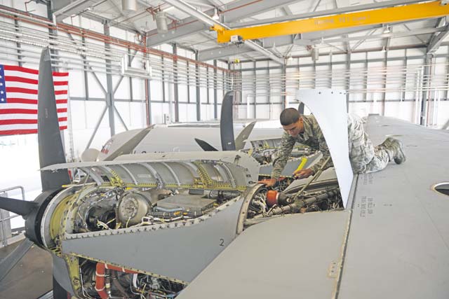 Photo by Staff Sgt. Kristopher LevasseurSenior Airman Michael Marquez, 86th Maintenance Squadron crew chief, inspects a C-130J Super Hercules inside and out for any visible mechanical defects.