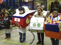 Photo by Sgt. Maj. Michael Pintagro“Drivers” watch for the checkered flag at the starting line during the “Cub-Annapolis” Dec. 7 at Vogelweh Elementary School.