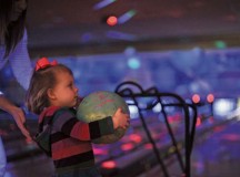 Photo by Airman 1st Class Michael StuartLila, 2, gets ready to roll a bowling ball during a deployed family event Oct. 23 at the Ramstein Bowling Center. The Airman & Family Readiness Center hosts a deployed family event once a month to improve the morale of families of deployed Airmen.