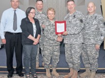Photo by Phil A. JonesFrom left, Harry Raith, Henny Moll, Command Sgt. Maj. Timothy Sprunger, Col. Judith Lee, 
Col. John Collins and Sgt. Major Brian Stauffer receive the MEDCOM Exceptional Organizational Safety Award.