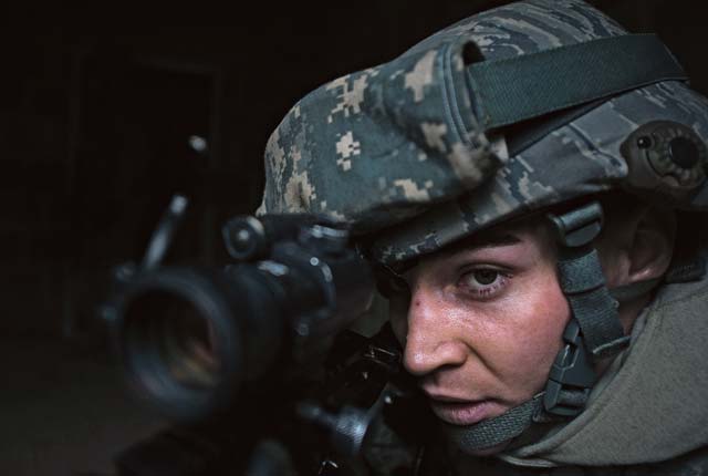 Photo by Senior Airman Damon KasbergAirman 1st Class Matthew Hulick, 514th Security Forces Squadron defender, scans his sector for opposition forces during an urban operations base security operations course.