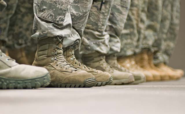 Military members with the 569th U.S. Forces Police Squadron conduct guard mount with the Cops 4 Causes organization Nov. 24 on Vogelweh. Cops 4 Causes discussed differences in their procedures with members of the 569th USFPS.