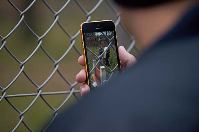 Sean Tabibian, Cops 4 Causes advisory board member, records a public military working dog demonstration at the 86th Security Forces Squadron MWD facility Nov. 22 on Ramstein. The military working dog handlers showcased the capabilities of their K-9s and their facility.