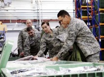 Photo by Sara PavichKisling NCO Academy instructors put together their chemical gear bags during a tour of Ramstein’s Joint Mobility Processing Center Feb. 24. The JMPC is Ramstein’s power projection platform to support commanders across three combatant commands by rapidly deploying personnel and cargo. NCO Academy instructors have the chance to disseminate information about the JMPC processes to their students.