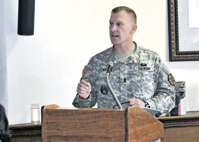 Command Sgt. Maj. Kenneth J. Kraus Jr., command sergeant major of U.S. Army Garrison Rheinland-Pfalz, speaks to Soldiers, civilians and family members during the 2014 Army Emergency Relief fundraising campaign kick-off  luncheon March 4 at the Landstuhl Community Club on Wilson Barracks.