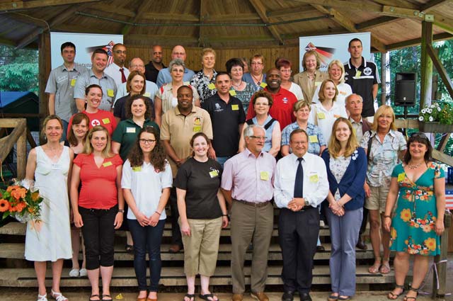 Courtesy photoAmerican club president Katie Pelltier (front row, third right) and German vice president Heinke Balzulat pose for a photo with donation recipients during a barbecue June 8. The German-American and International Women’s Club Kaiserslautern donated €27,750 from the proceeds of their annual Pfennig Bazaar in March to various charity organizations.