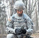 Pfc. Shane T. Waite, an intelligence analyst assigned to the 
21st Theater Sustainment Command, checks his azimuth during the daytime land navigation portion of the 21st TSC’s 21st Special Troops Battalion Best Warrior Competition April 3 on Rhine Ordnance Barracks.