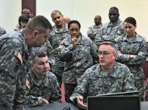 Soldiers from the 21st Theater Sustainment Command and the 7th Civil Support Command listen to guidance on foreign consequence management products from Col. Russell A. Henderson, the 7th CSC deputy commanding officer, during quarterly FCM training Nov. 19 on Daenner Kaserne.
