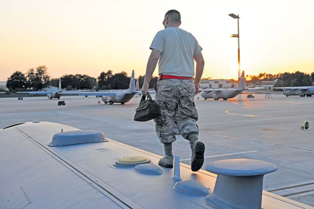Photo by Senior Airman Chris WillisAirman 1st Class Frank Molina, 86th Maintenance Squadron fuel system repair technician, goes over end-of-day aircraft checks. 